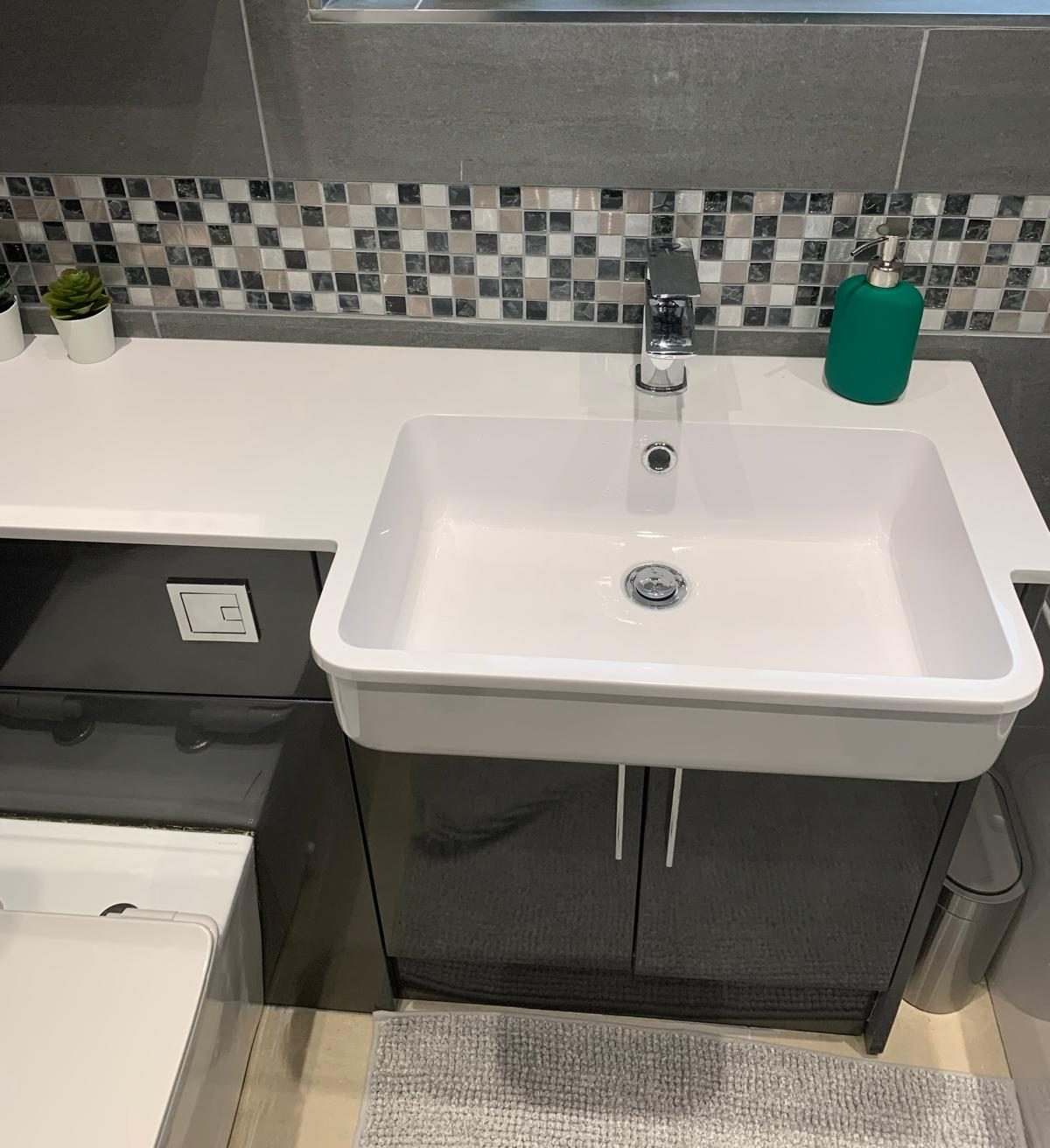 The refitted bathroom vanity and basin